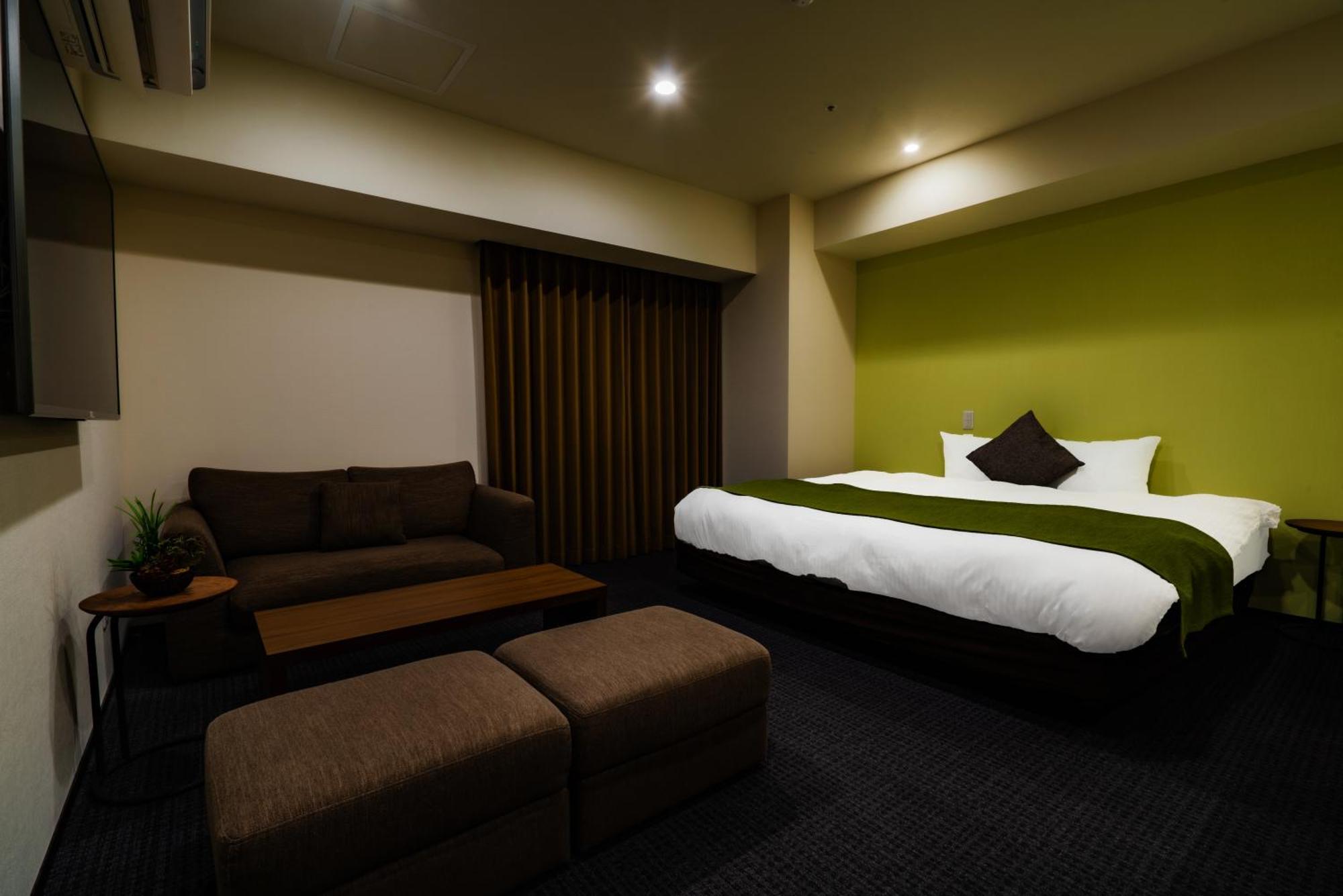 Randor Hotel Sapporo Suites Ruang foto A room at the hotel