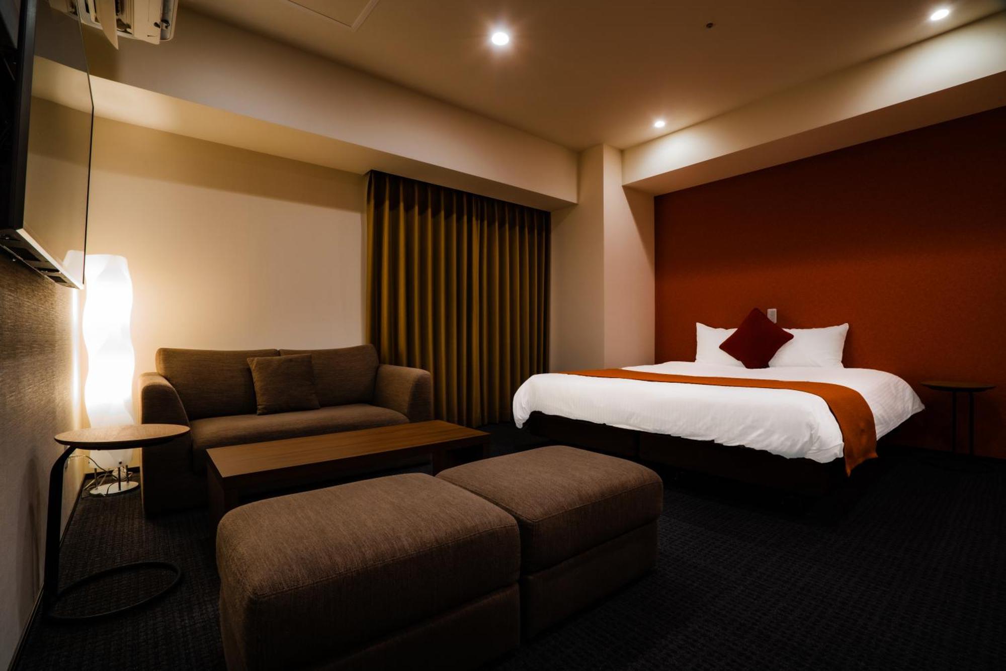 Randor Hotel Sapporo Suites Ruang foto A room at the hotel