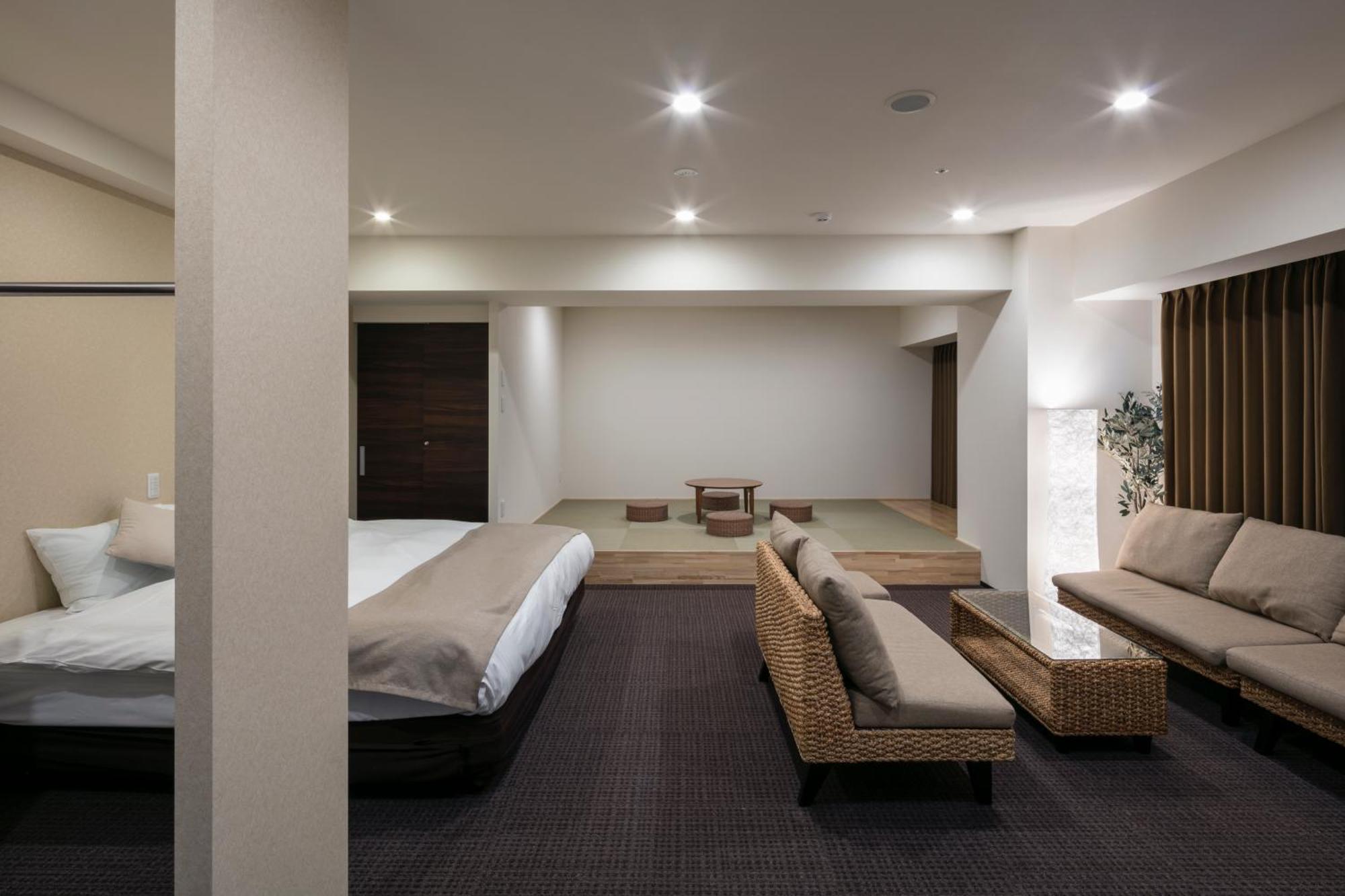 Randor Hotel Sapporo Suites Ruang foto A room at the hotel