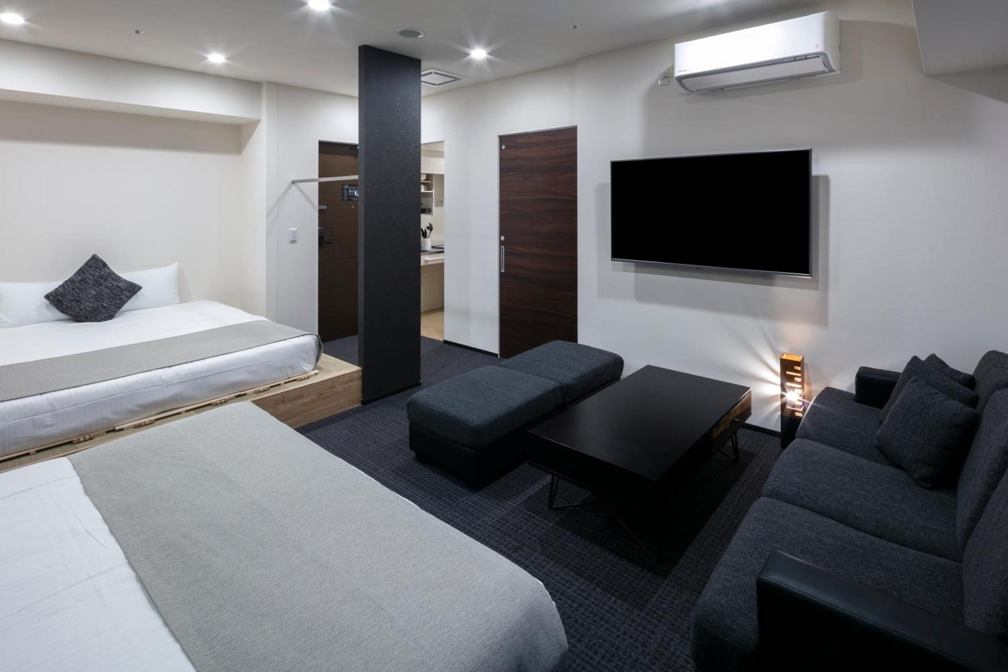 Randor Hotel Sapporo Suites Ruang foto A room at the hotel