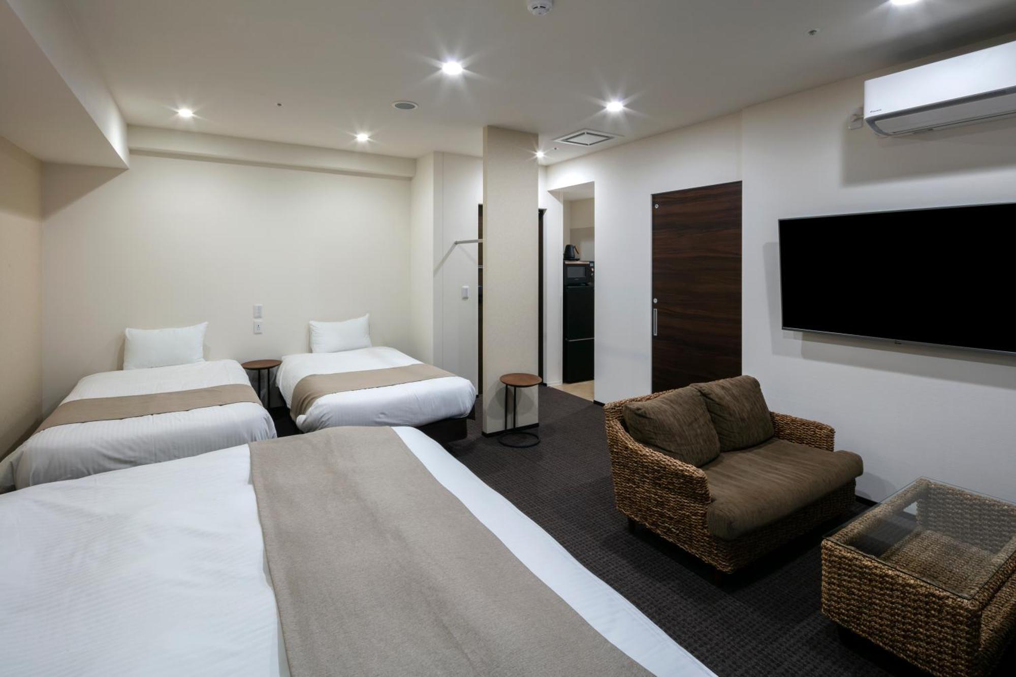Randor Hotel Sapporo Suites Ruang foto A typical room at the hotel