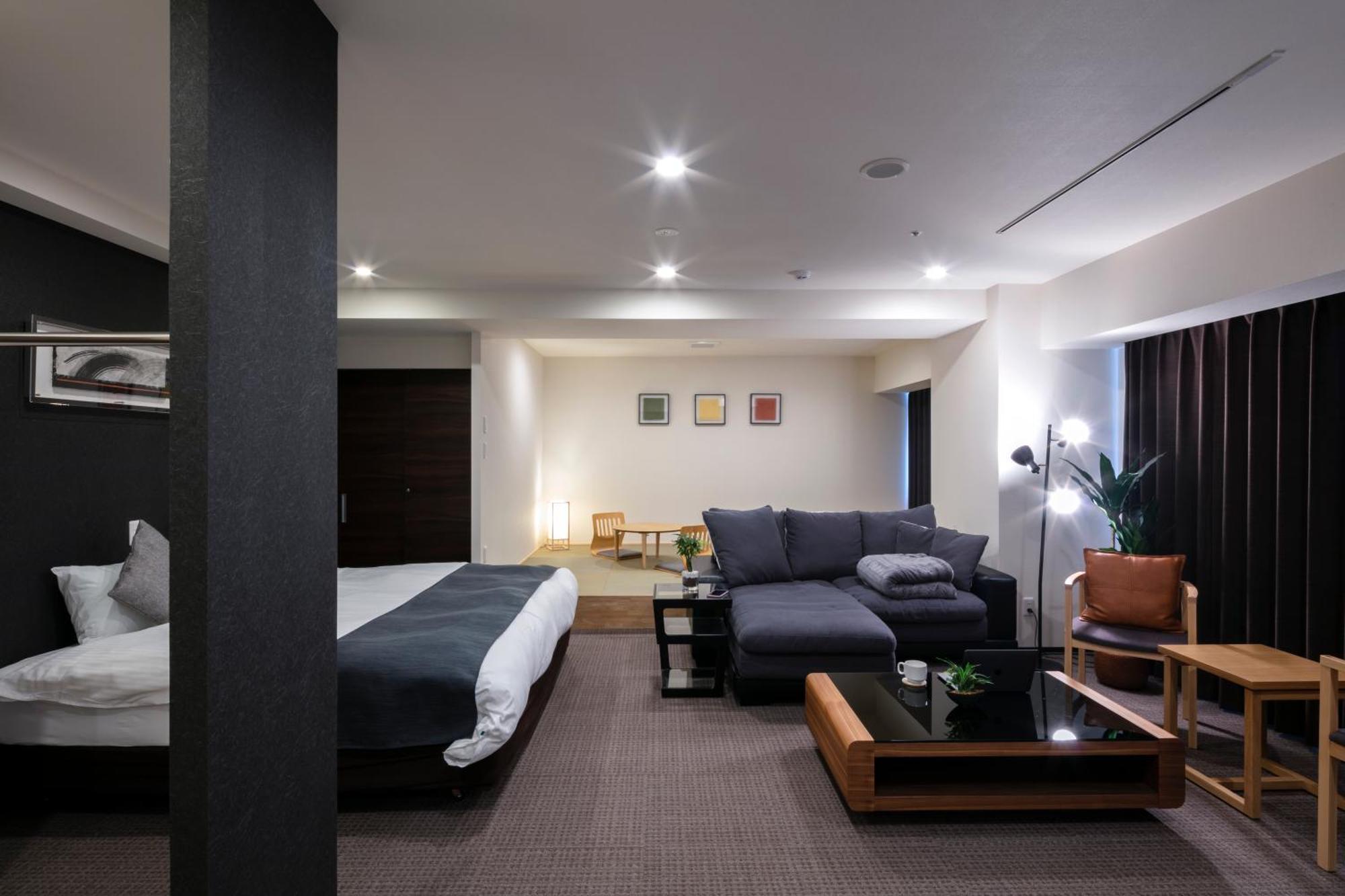 Randor Hotel Sapporo Suites Ruang foto A room at the hotel