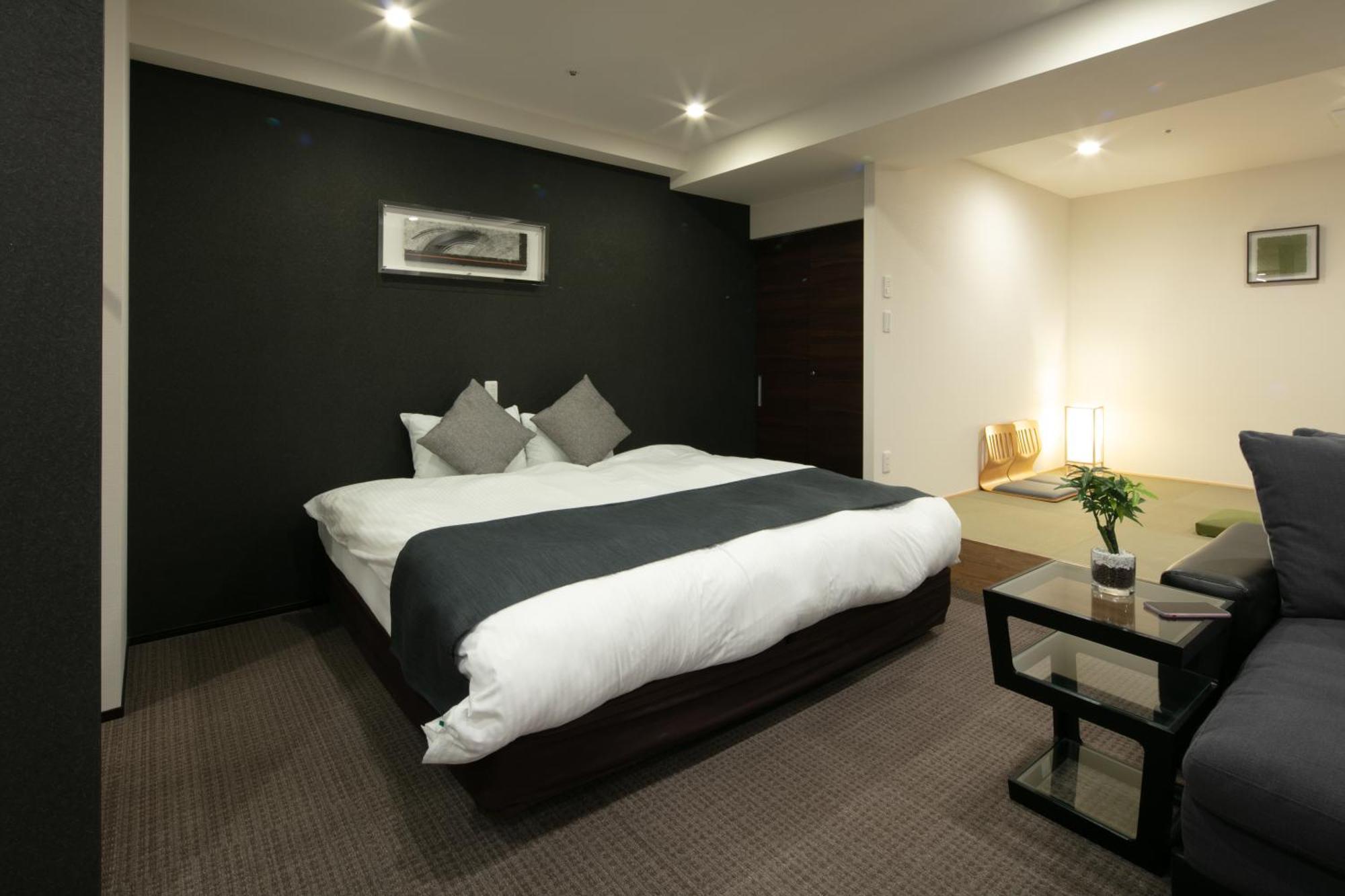 Randor Hotel Sapporo Suites Ruang foto A typical hotel room