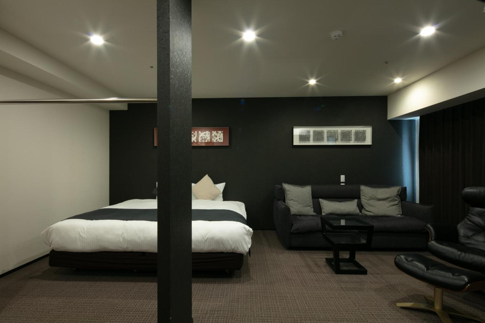 Randor Hotel Sapporo Suites Ruang foto A room at the hotel